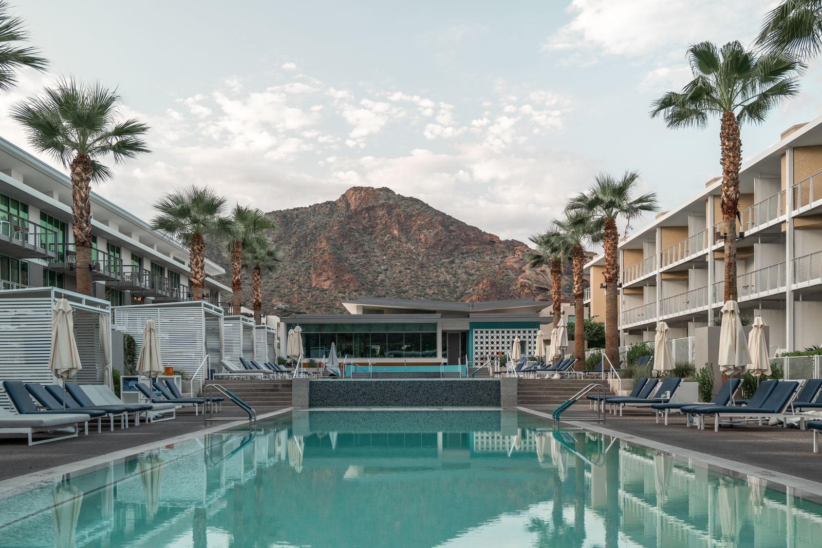 Arizona pool framed by palm trees and Camelback Mountain in Scottsdale